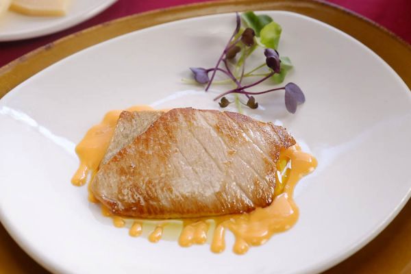 Tuna belly with a cold creamy tomato soup